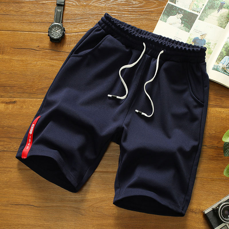 Wholesale M-4XL Men Fashion Solid Color Drawstring Loose Sports Shorts